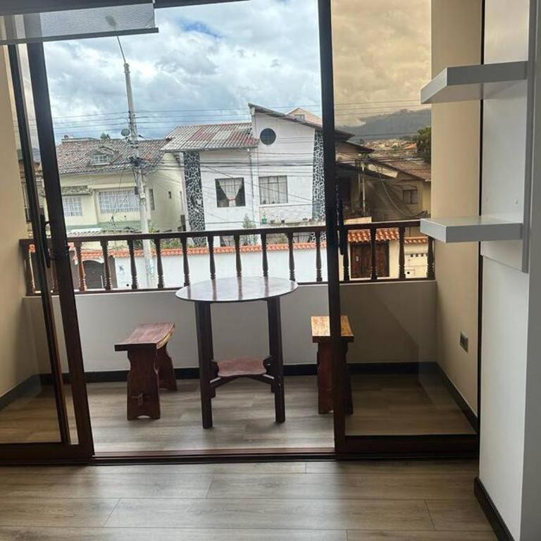 Sucre Suites Cuenca - Suite Deluxe con cama extragrande - 17
