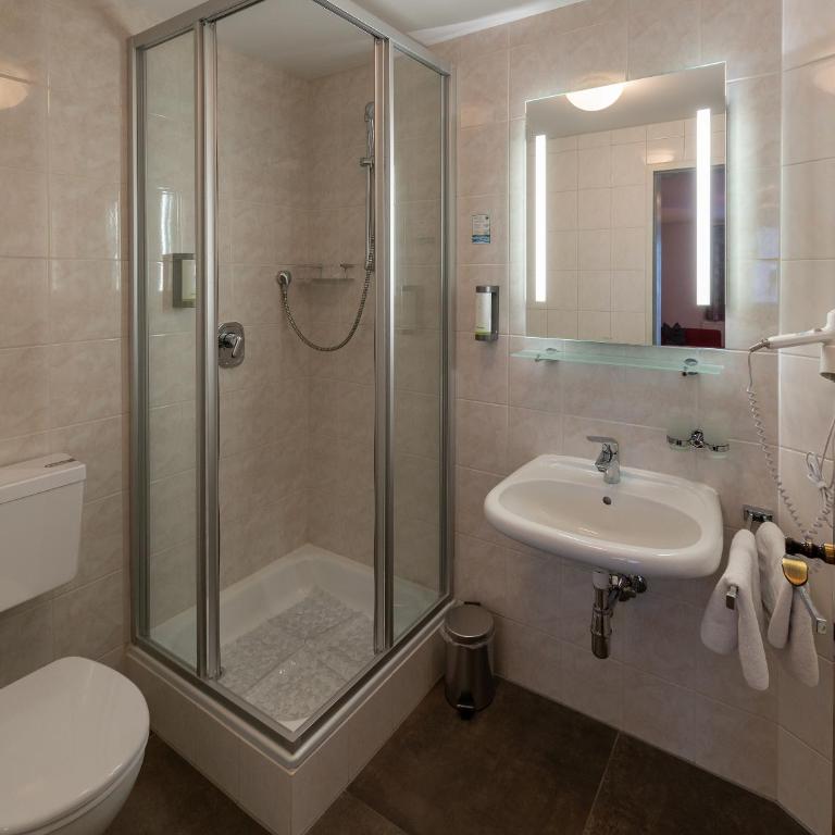 Pension Haus in der Sonne - Comfort Dreibettzimmer - 11