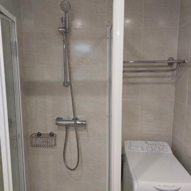 Vistas al mar. Junto a la playa. Garaje y piscina. - Apartamento de 1 dormitorio - 15