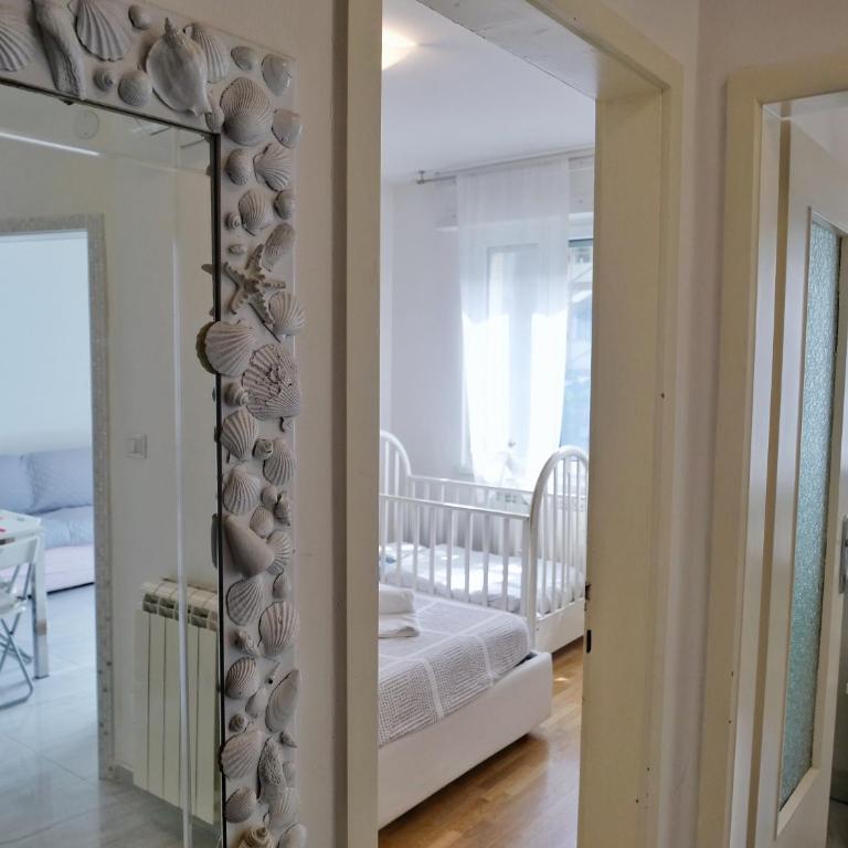 FIORE DI MARE - Delizioso bilocale con posto auto vicino al porto - Appartamento con 1 Camera da Letto - 17