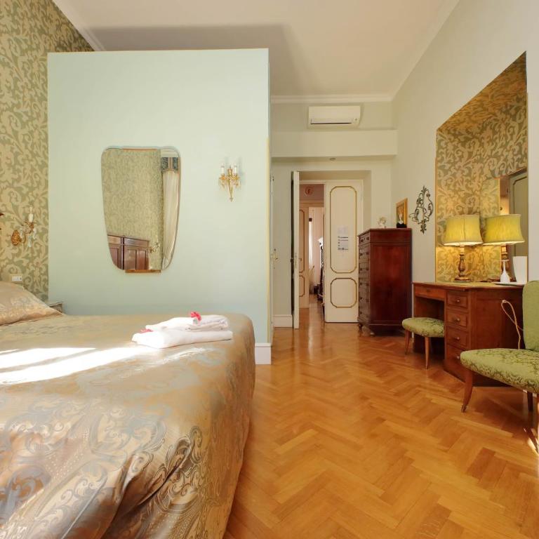 Domus Monamì Luxury Suites - Spaziosa Camera Matrimoniale/Doppia con Letti Singoli con Vista Giardino - 15