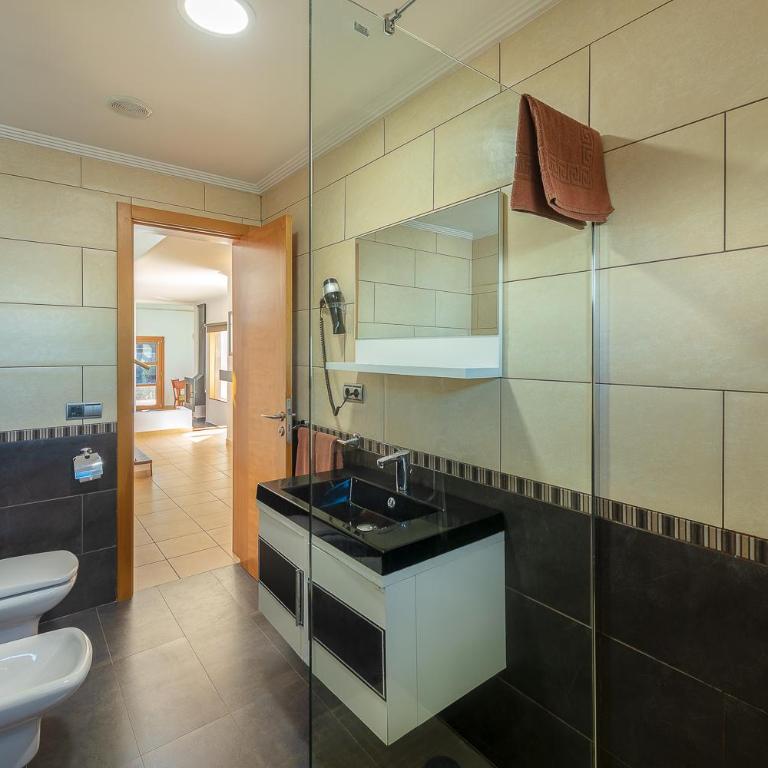 Camelot Holiday Homes by LIVVO - Villa de 3 dormitorios - 28