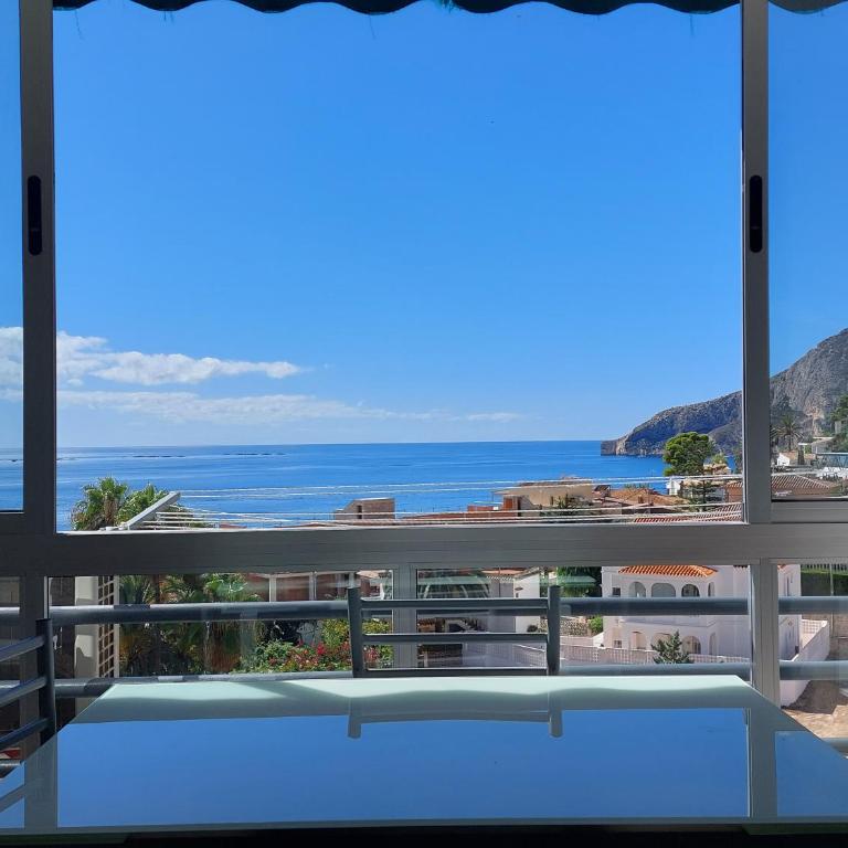 Vistas al mar. Junto a la playa. Garaje y piscina. - Apartamento de 1 dormitorio - 3