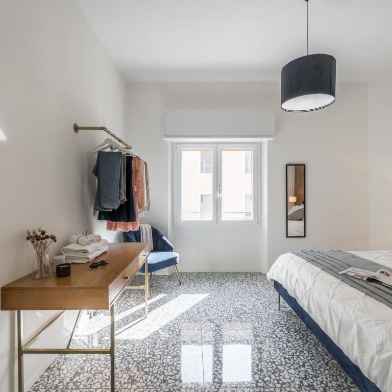 Altalena sulla piazza, un affaccio d'eccezione - Appartamento con 2 Camere da Letto - 37
