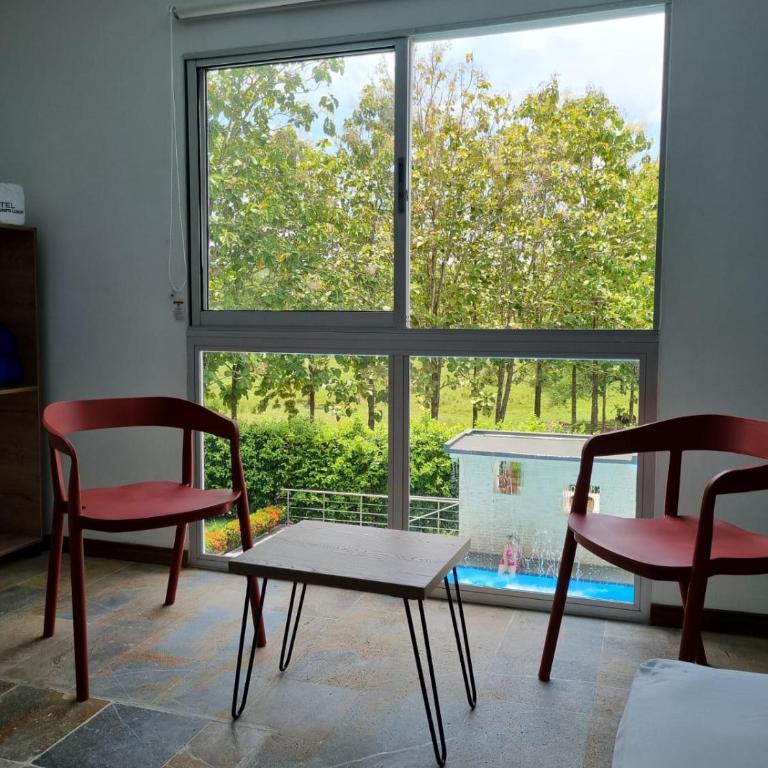 Hotel Puerto Triunfo - Quadruple Room with Garden View - 1