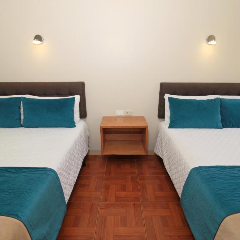 Hostal Plaza by Elvita - Habitación Doble Deluxe - 2 camas dobles - 5