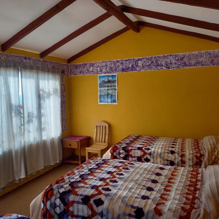 Refugio Ecologico Kalluchi - Habitación Doble con baño privado y vistas al lago - 2 camas - 4