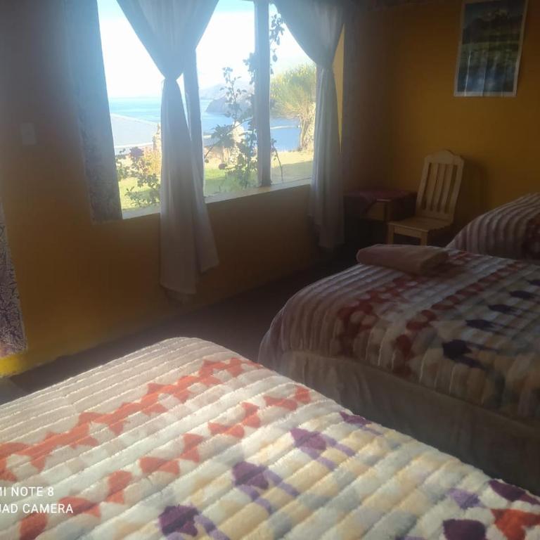 Refugio Ecologico Kalluchi - Habitación Triple con baño privado y vistas al lago - 2