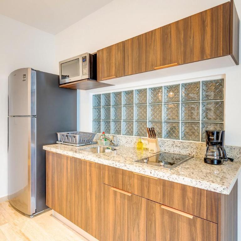 Chic Condotel with Roof Pool 10-Min Walk to Beach - Appartement 1 Chambre - Vue sur Jardin - 10