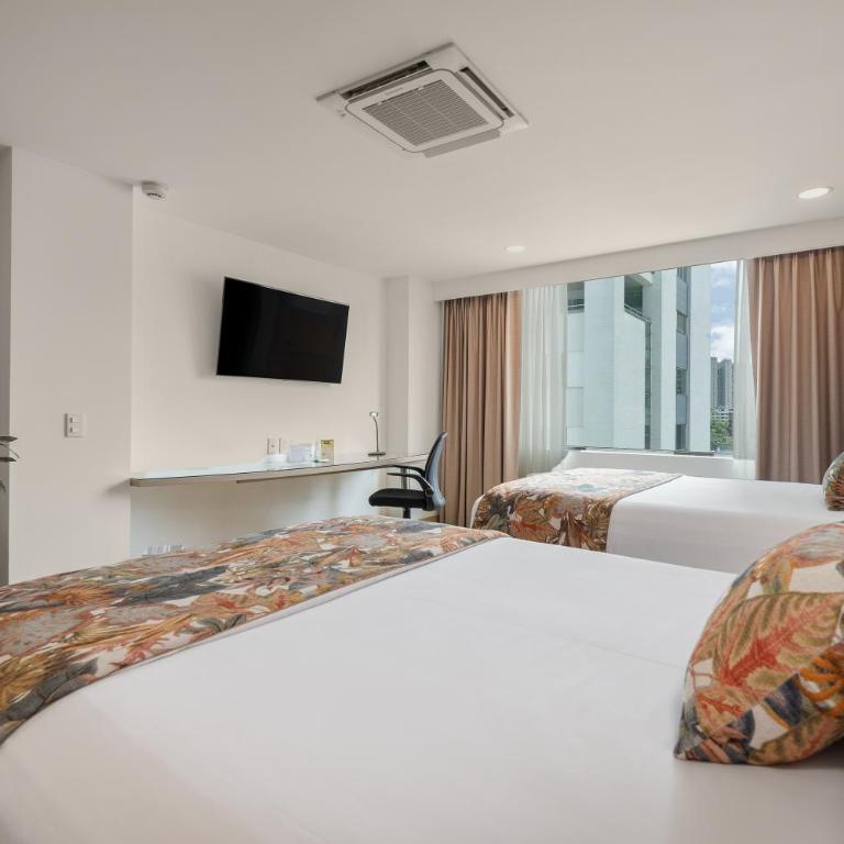 Novelty Suites Hotel - Suite Doble Estándar - 9