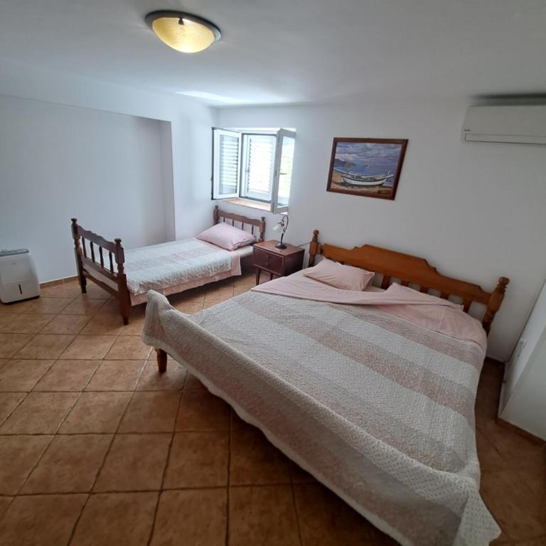 Apartments Pejanović - One-Bedroom Apartment with Patio and Sea View - 7