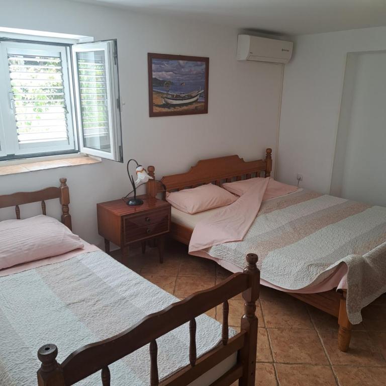 Apartments Pejanović - One-Bedroom Apartment with Patio and Sea View - 11