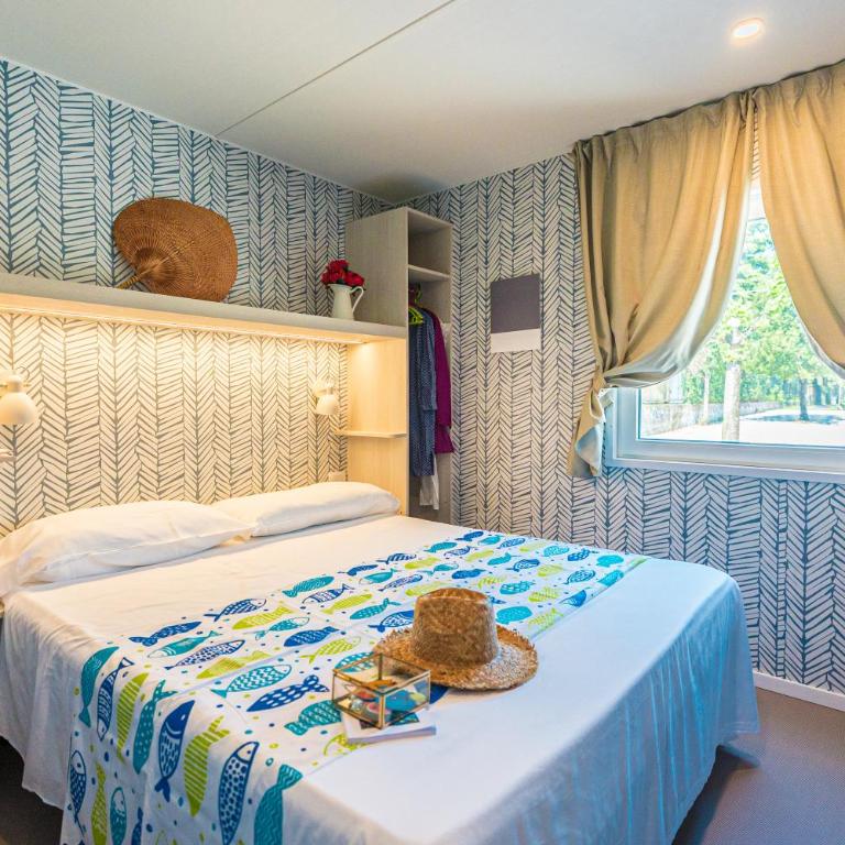 Village & Glamping Riva Blu - Mobilheim mit Seeblick - 6