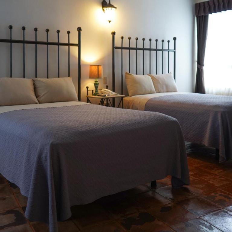 Hotel Real de Leyendas - Standard Double Room with Two Double Beds - 2