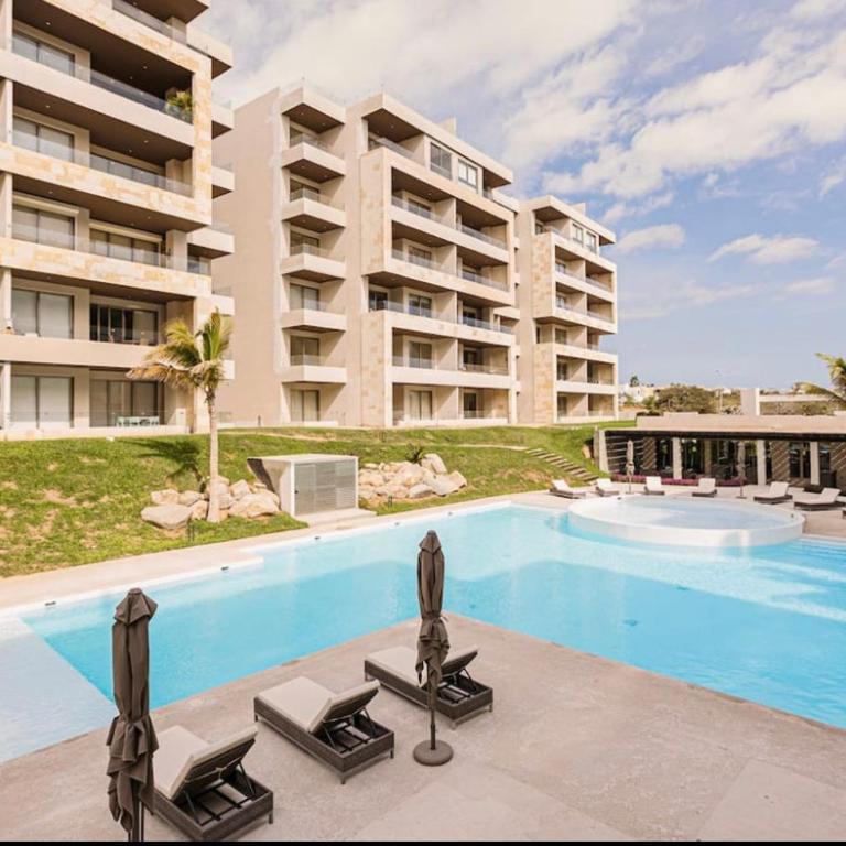 Loft con balcón privado, estacionamiento gratis - Un oasis en Los Cabos - Apartamento de 1 dormitorio - 32