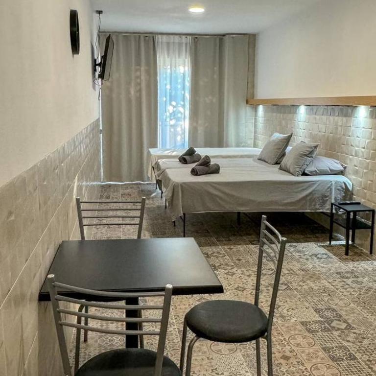 Apartamentos La Ruta - Quadruple Room with Terrace - 11