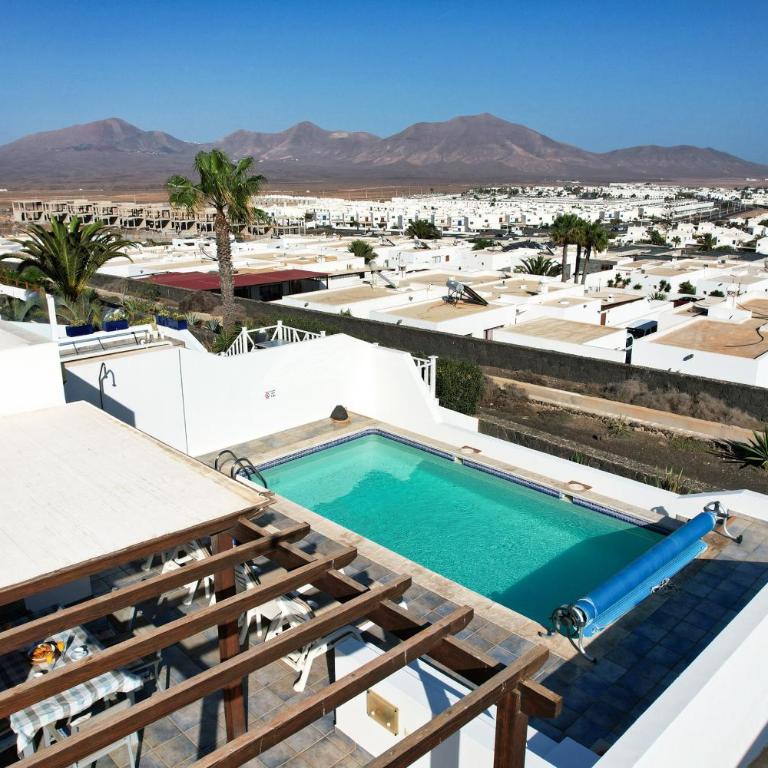 Lava and Sea - Private pool, BBQ and amazing sea views By Lanzarote Vacation Homes - Three-Bedroom House - 54