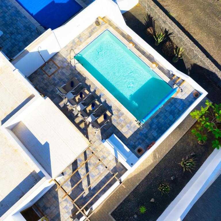 Lava and Sea - Private pool, BBQ and amazing sea views By Lanzarote Vacation Homes - Three-Bedroom House - 53