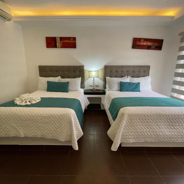 Hosteria Punta Blanca - Habitación Triple Deluxe - 1