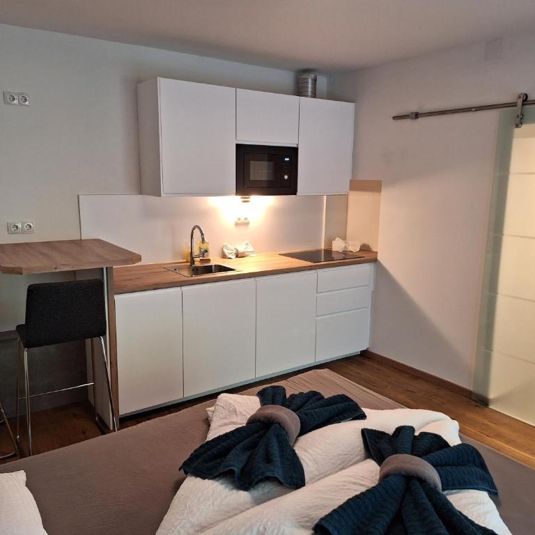 Flataid Gästehaus Graschi - Steinbergstraße - Studio-Apartment - 6