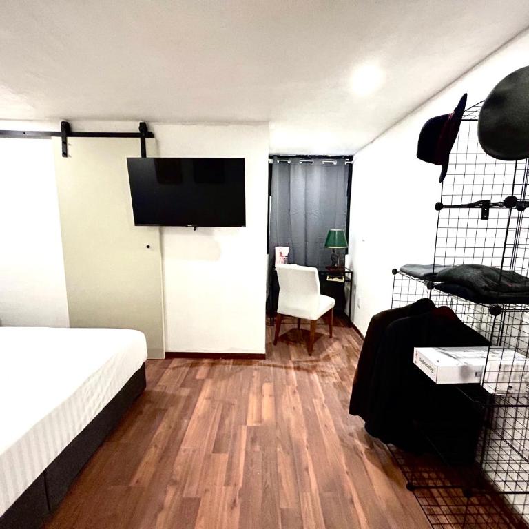 Lindas Suites Eugenio Sue - Queen Room - 11
