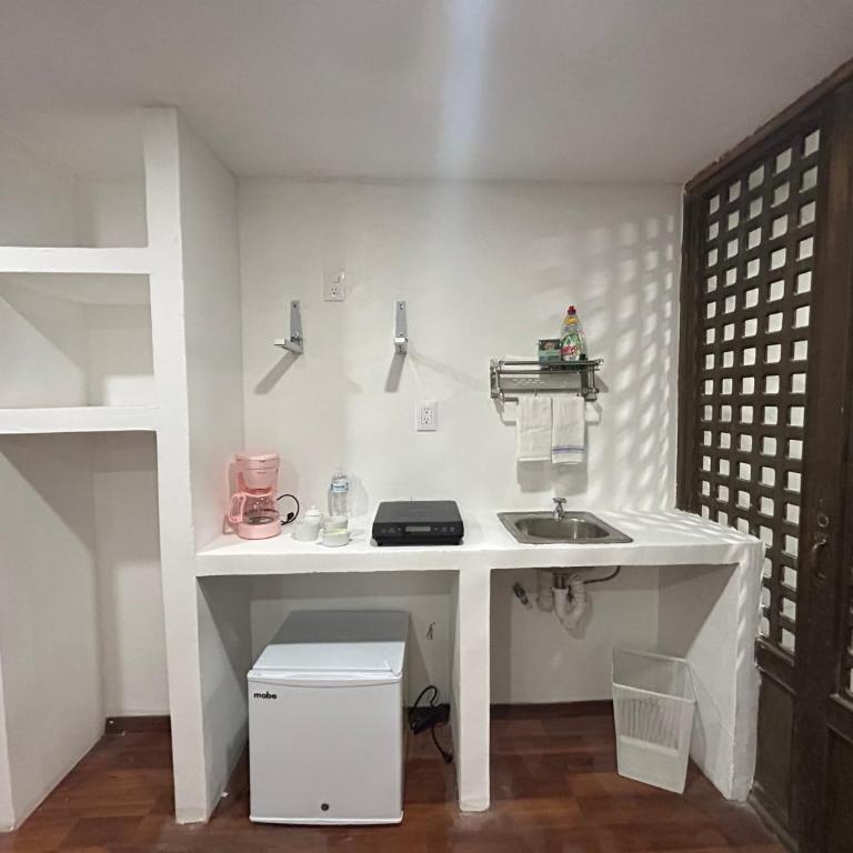 Lindas Suites Eugenio Sue - King Room - 8