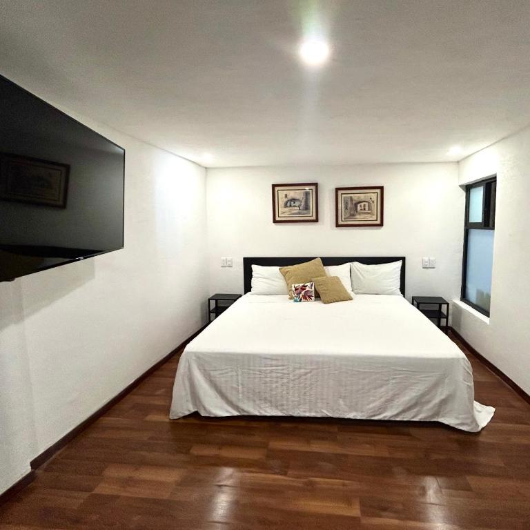 Lindas Suites Eugenio Sue - King Room - 6