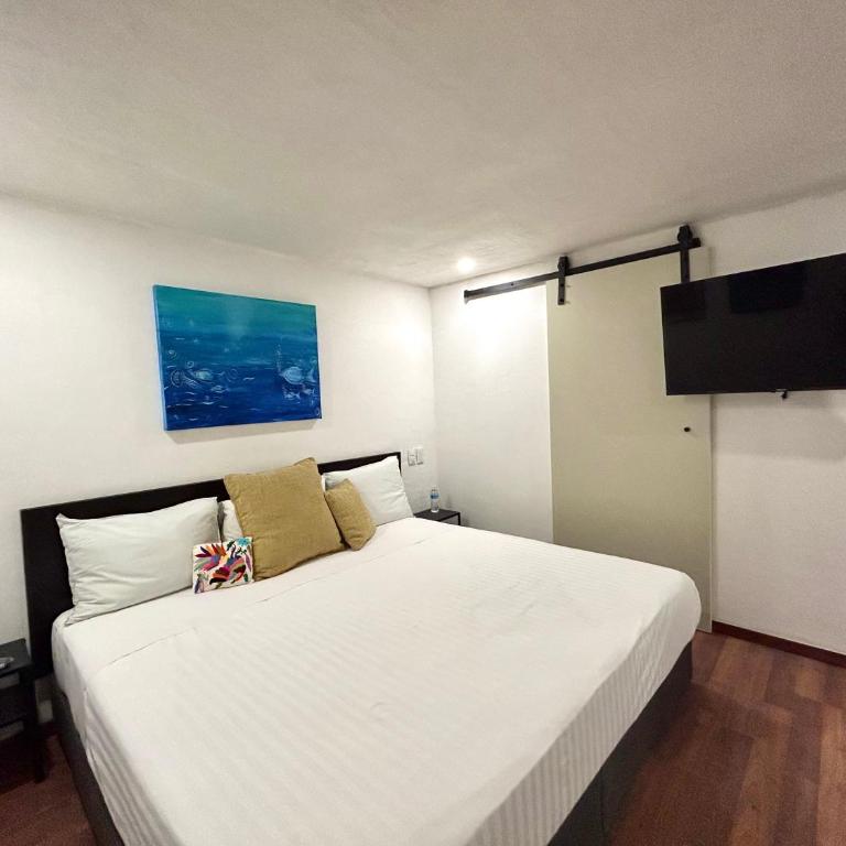 Lindas Suites Eugenio Sue - Queen Room - 3