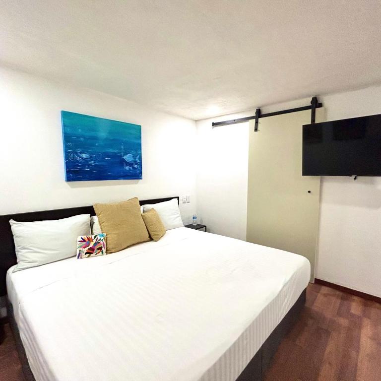 Lindas Suites Eugenio Sue - Queen Room - 14