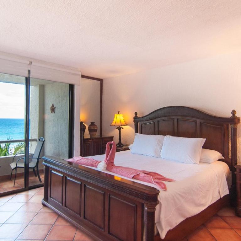 Solymar Condo Beach Resort by Casago - Deluxe King Suite - 1