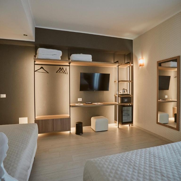 Castrichella Smart Boutique Hotel Rome Airport - Camera Tripla Deluxe - 3