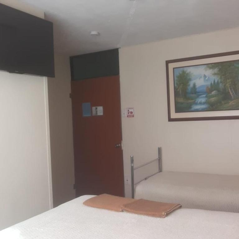 Hostal El Auténtico Diamante - Habitación Doble con baño privado - 2 camas - 6