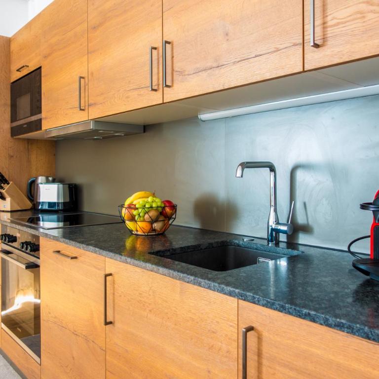 AlpenParks Hotel & Apartment Carpe Solem Mariapfarr - Apartment mit 4 Schlafzimmern und einem Balkon - 7