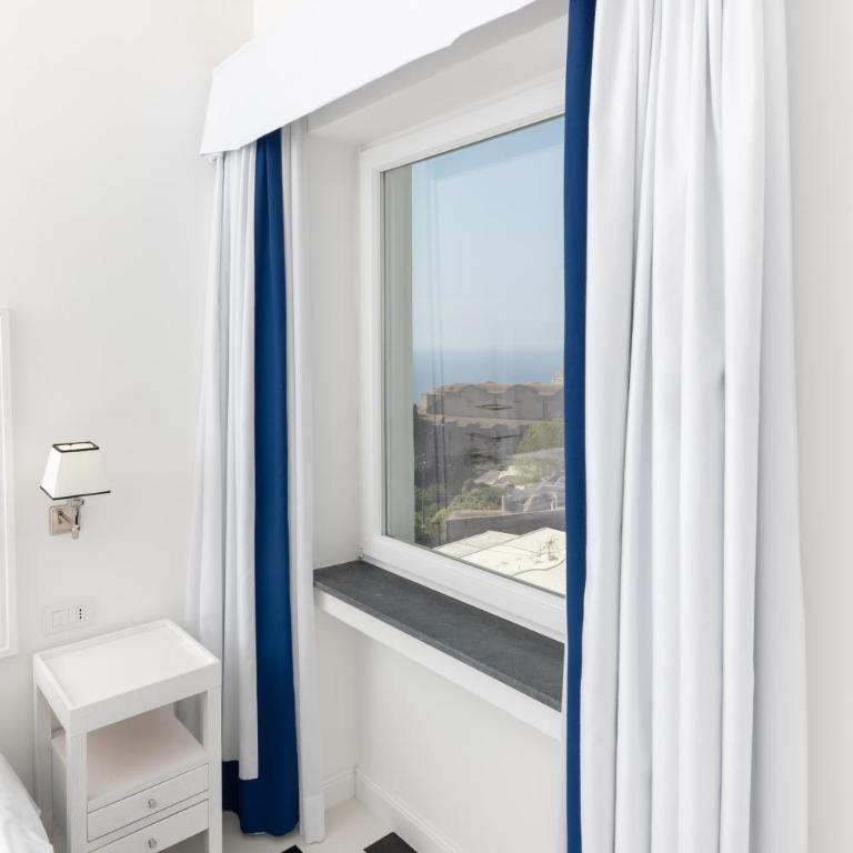 Hotel Mamela - Camera Matrimoniale/Doppia con Letti Singoli con Vista Mare Parziale - 1