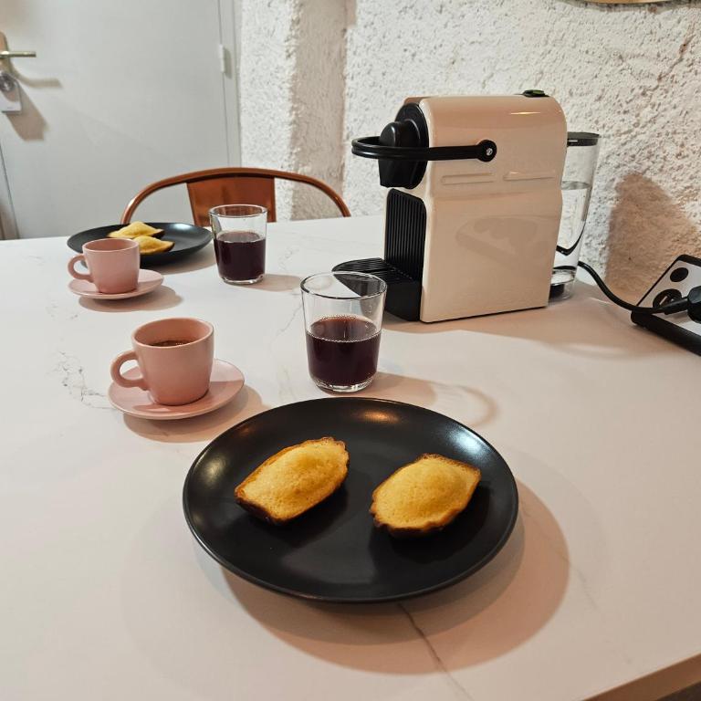 Suite charmante proche du temple romain - Apartment mit 1 Schlafzimmer - 16