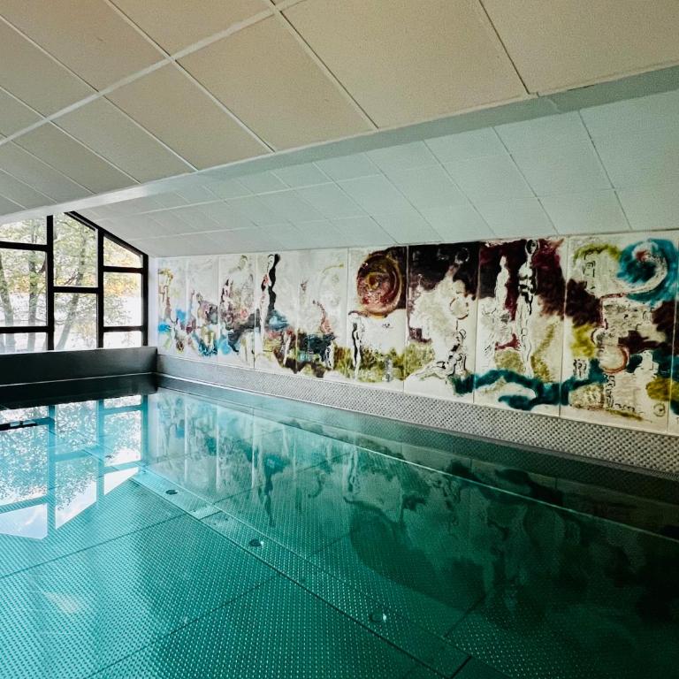 See-Apartment AURA am Fuße der Gerlitzen Alpe und Ufer des Ossiacher Sees - mit privatem Seezugang & Hallenbad - Apartment - 24