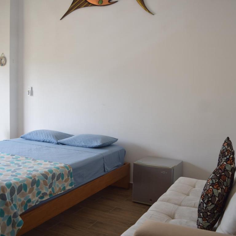 Ohana Beach Hotel - Habitación Familiar con baño privado - 10