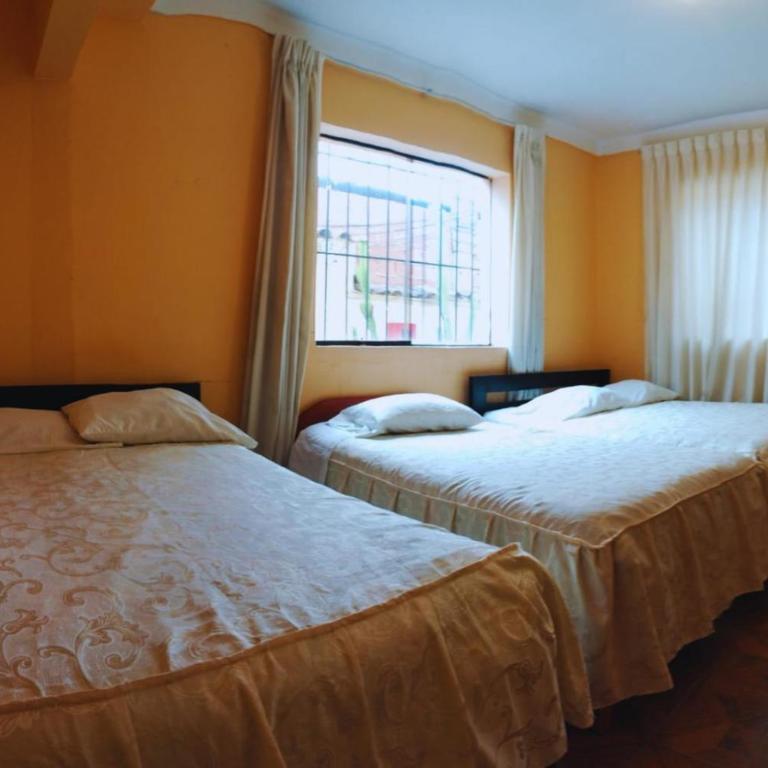 HOSPEDAJE IMPERIO INKA CUSCO - Habitación cuádruple - 1