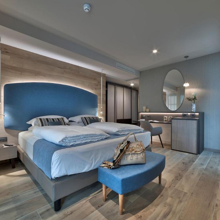 Villa Remo by Hotel Galvani - Suite mit Kingsize-Bett, Terrasse und Seeblick - 3