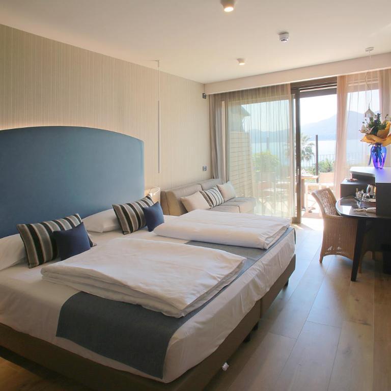 Villa Remo by Hotel Galvani - Deluxe Doppelzimmer mit Terrasse und Seeblick - 6