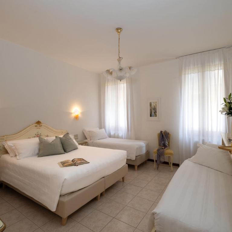 Hotel Guerrini - Camera Quadrupla con Bagno Privato - 1