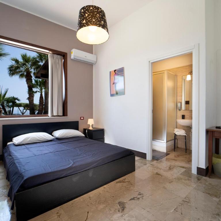 Kòre rooms - Camera Matrimoniale con Patio - 1