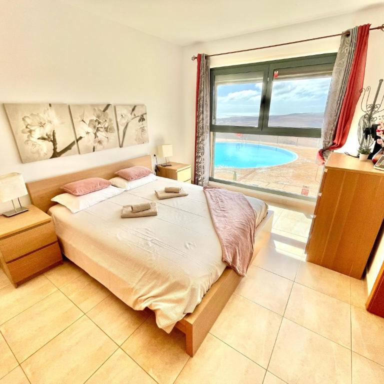 Triplex Caleta de Fuste Impresionantes vistas - Three-Bedroom Apartment - 36