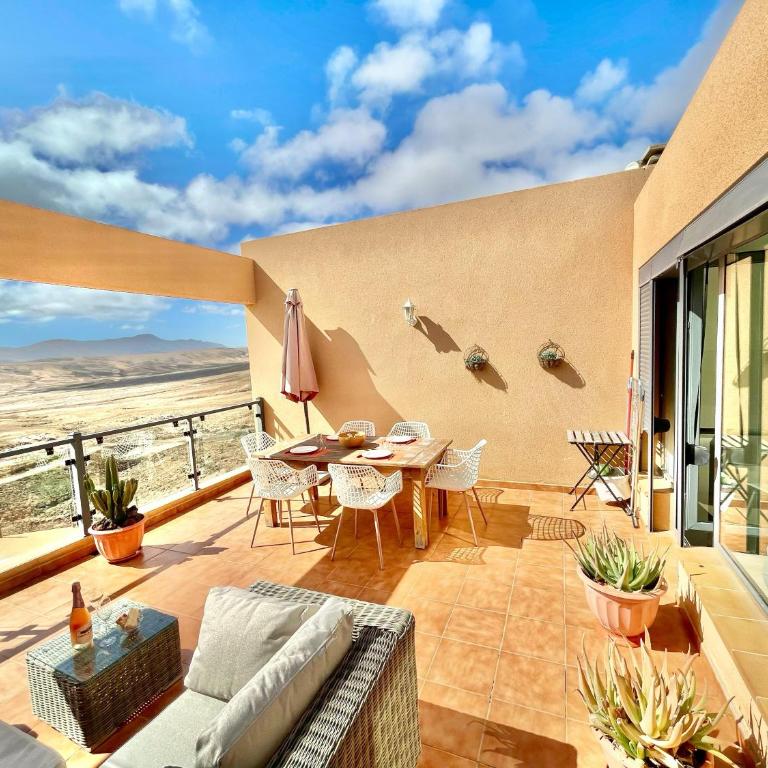 Triplex Caleta de Fuste Impresionantes vistas - Three-Bedroom Apartment - 8