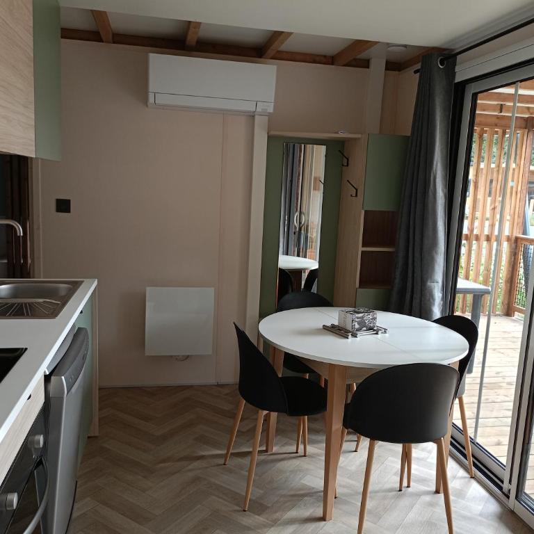 Camping La Marmotte - Chalet 2 Chambres - 4