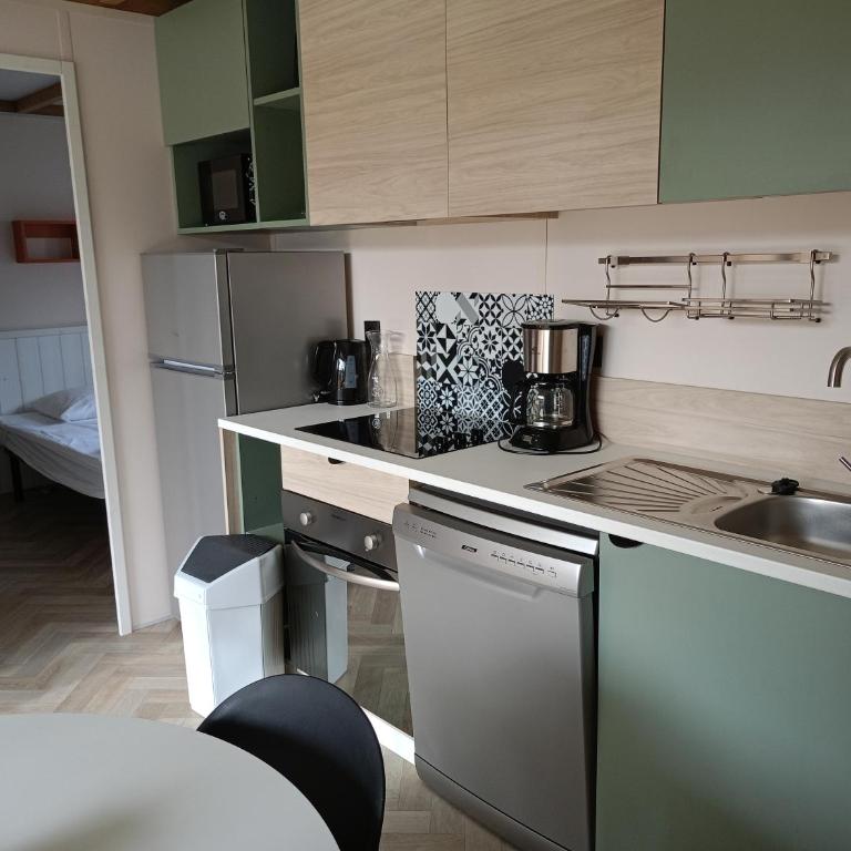 Camping La Marmotte - Chalet 2 Chambres - 5