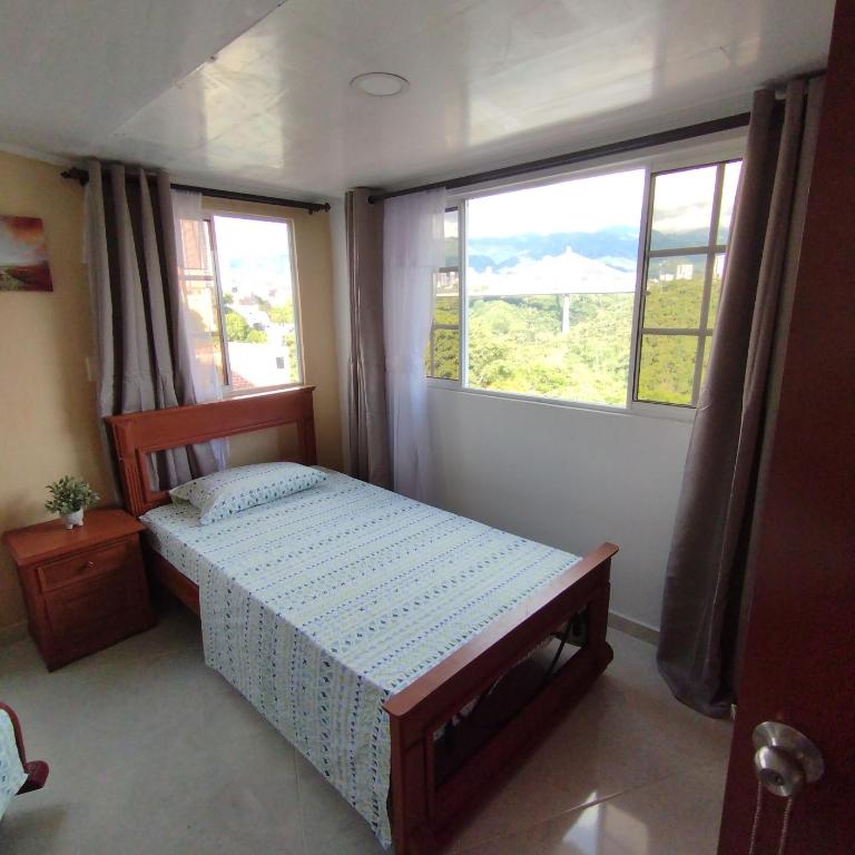 Apartamento con vista a la ciudad en barrio campo hermoso 301 - Three-Bedroom Apartment - 13