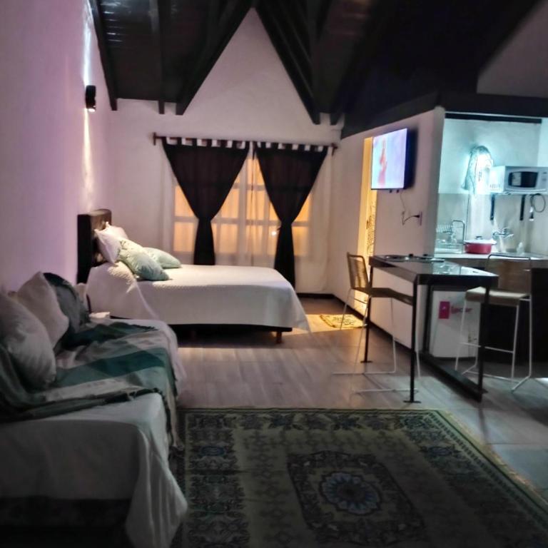 Cabañas las palmeras - Habitación Cuádruple - vistas al jardín - 2