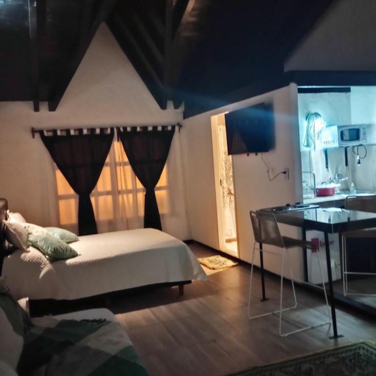 Cabañas las palmeras - Habitación Cuádruple - vistas al jardín - 1