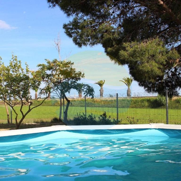 Quet - Casa rural con piscina privada en el Delta del Ebro - Deltavacaciones - Three-Bedroom Townhouse - 1